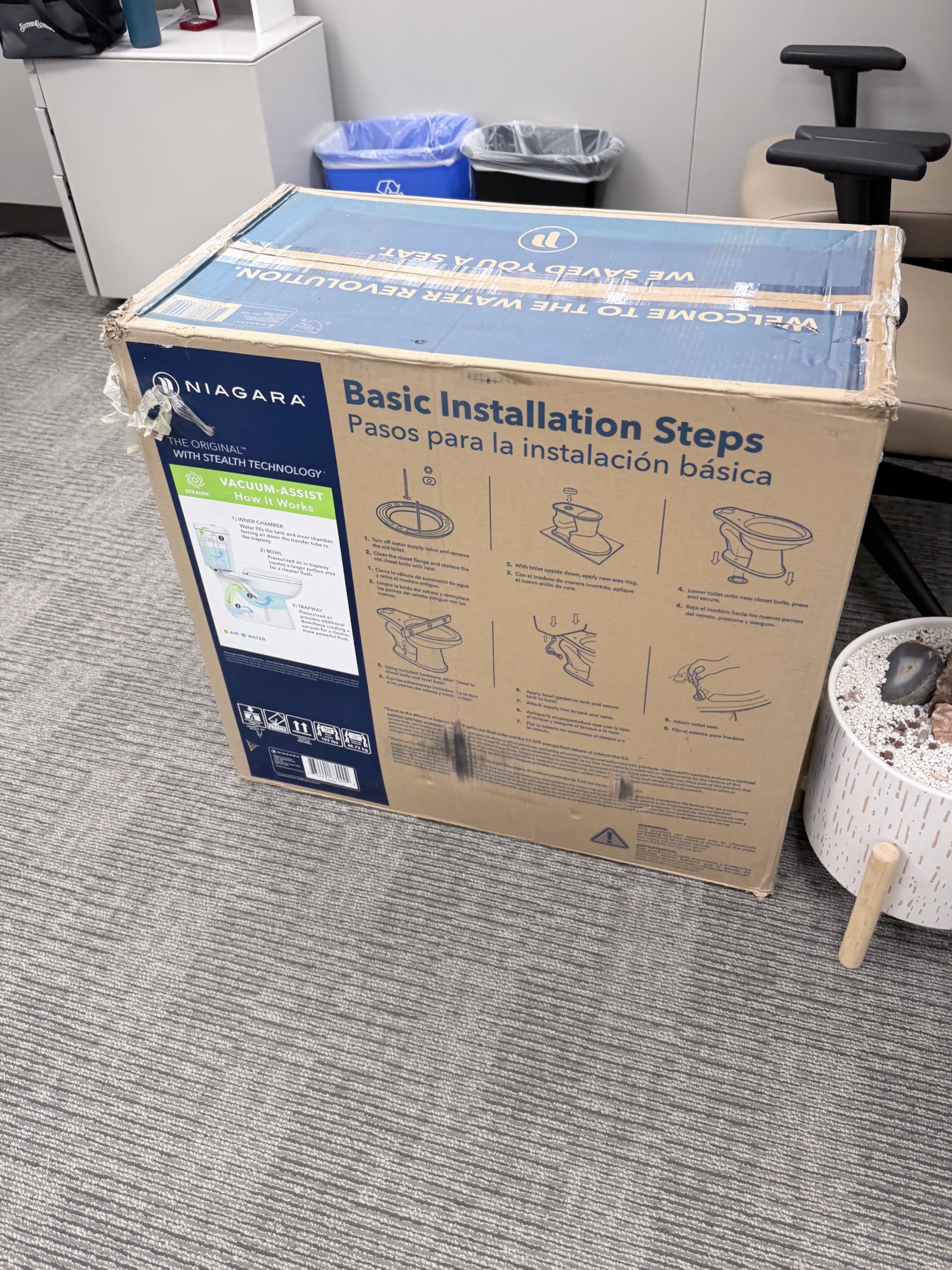 The boxed Niagara high-efficiency toilet after delivery to the Aim Dynamics office